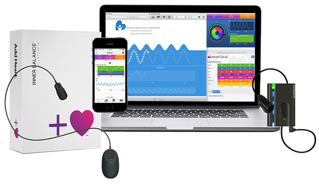 HeartMath heart rate sensor with a laptop and phone showing heart rhythm data